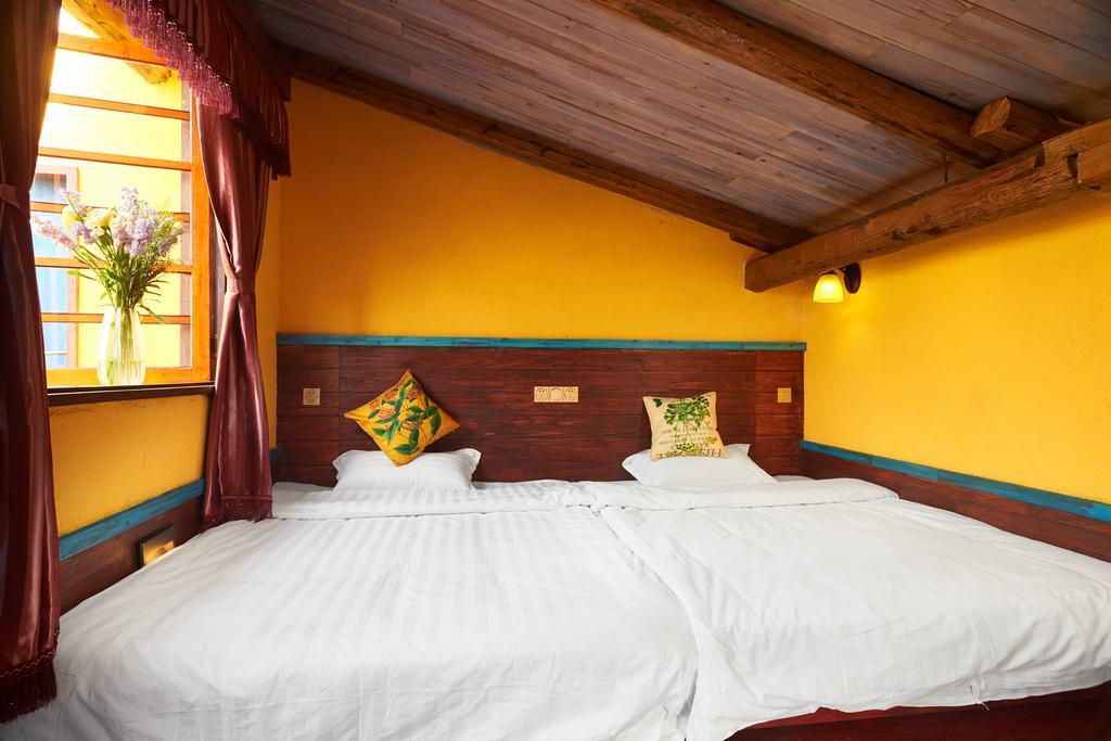 Jiumi Snow Mountain Original Art Hotel شانغريلا المظهر الخارجي الصورة